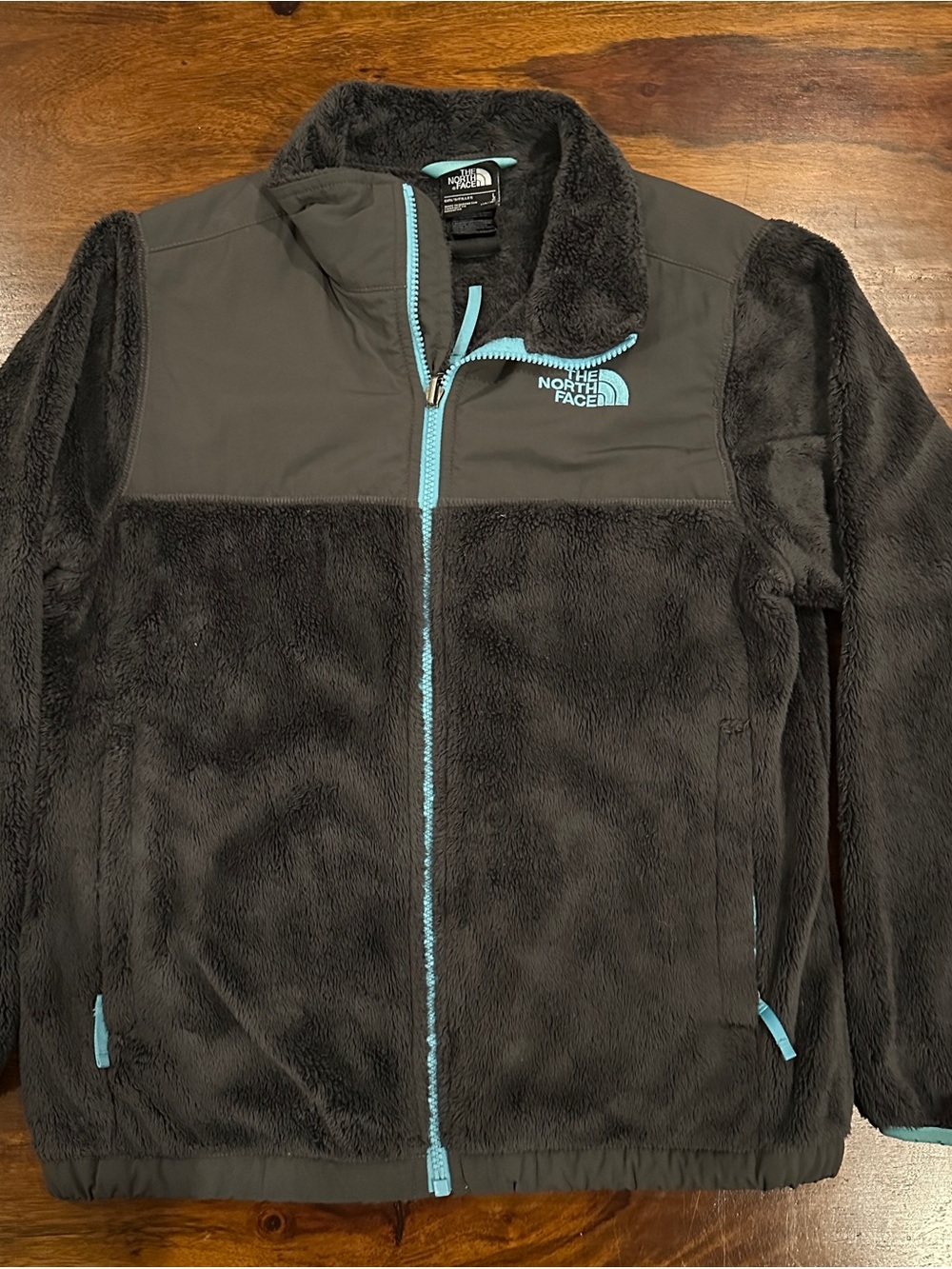 The North Face Girls Black Fleece Jacket with Light Blue Accents